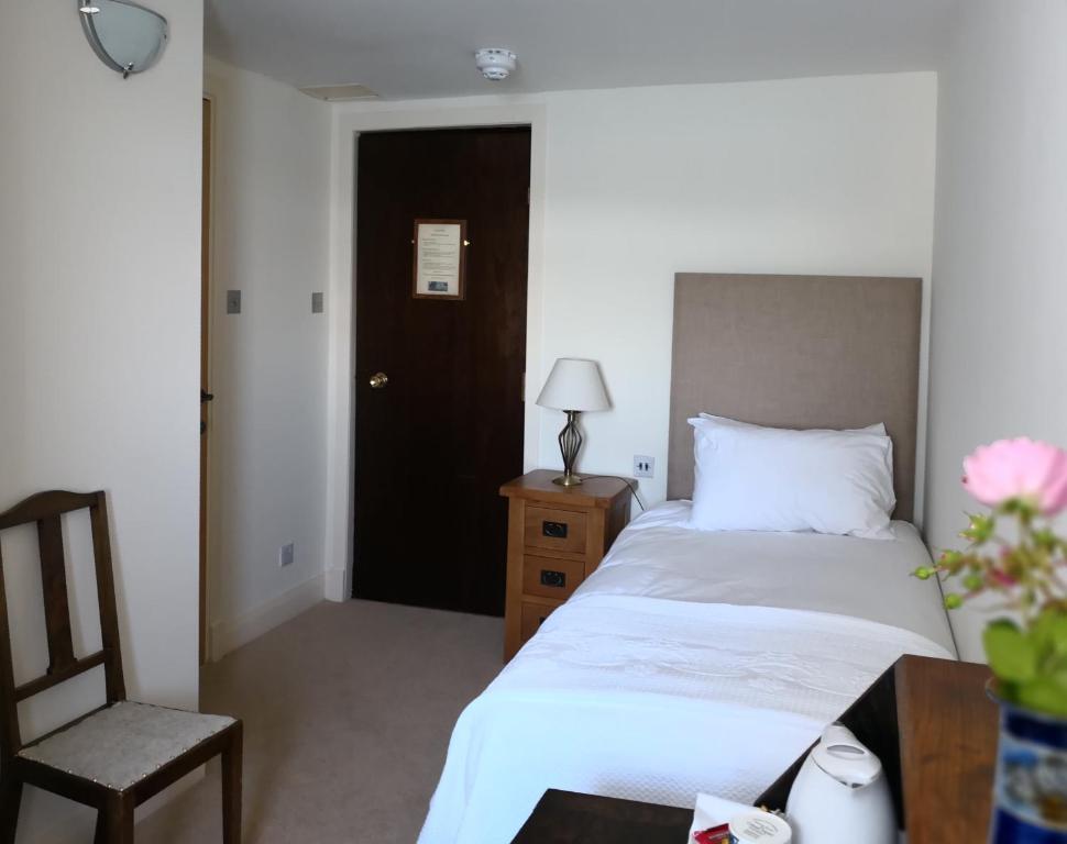 Postel nebo postele na pokoji v ubytování Crinan Hotel