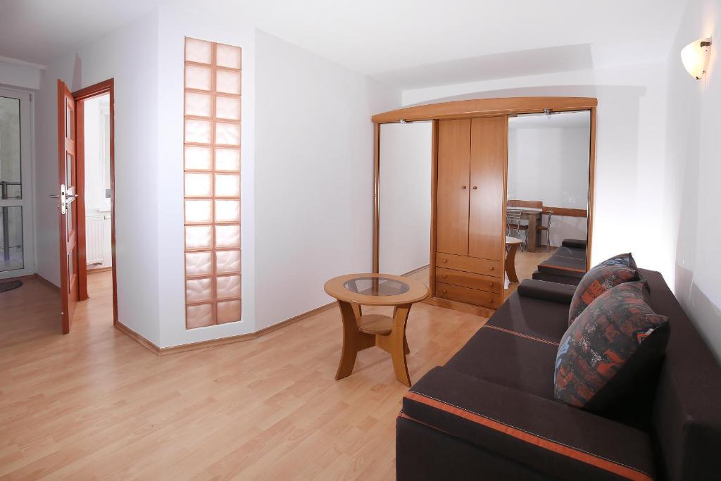 Posedenie v ubytovaní 100-SIO Apartamenty