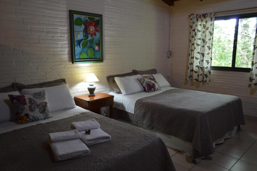 Postel nebo postele na pokoji v ubytování Oasis Bed and Breakfast