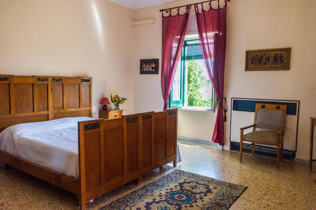 Posteľ alebo postele v izbe v ubytovaní Affascinante Villa Ottocentesca a Caltagirone
