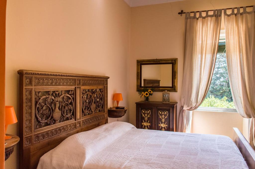 Posteľ alebo postele v izbe v ubytovaní Affascinante Villa Ottocentesca a Caltagirone