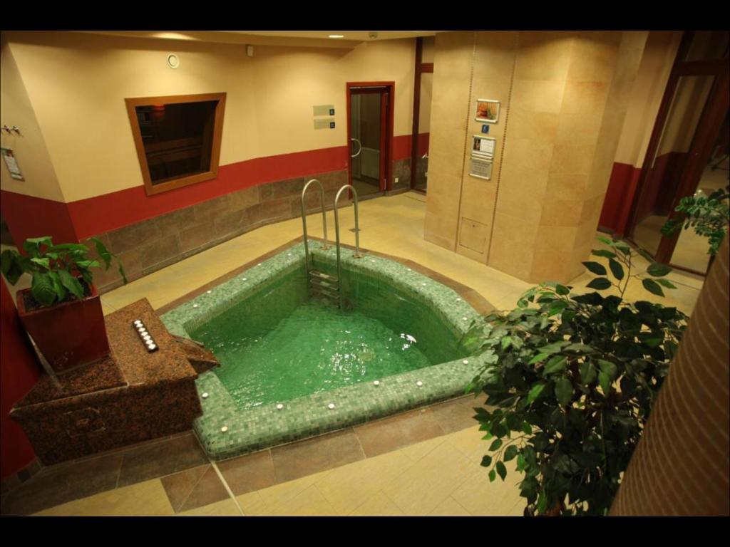 The swimming pool at or close to Apartman Golf Lux