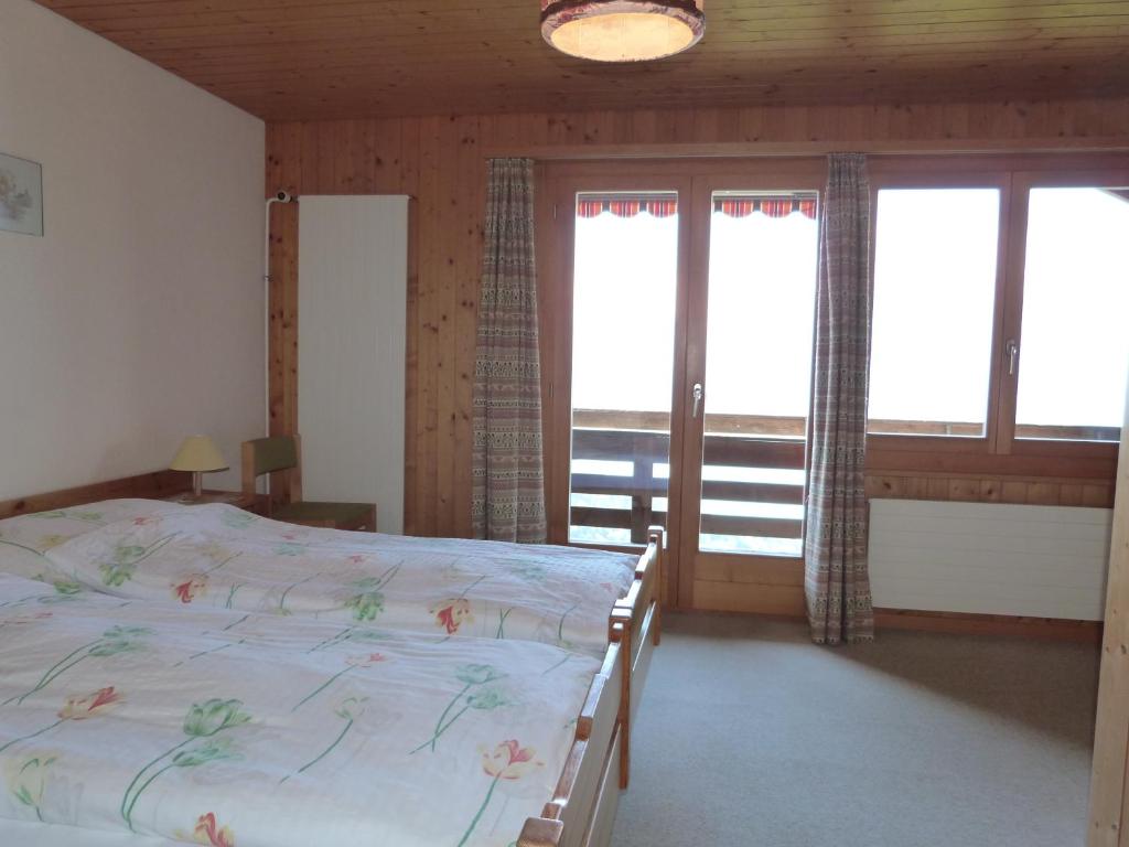 Postel nebo postele na pokoji v ubytování Hotel Bellevue