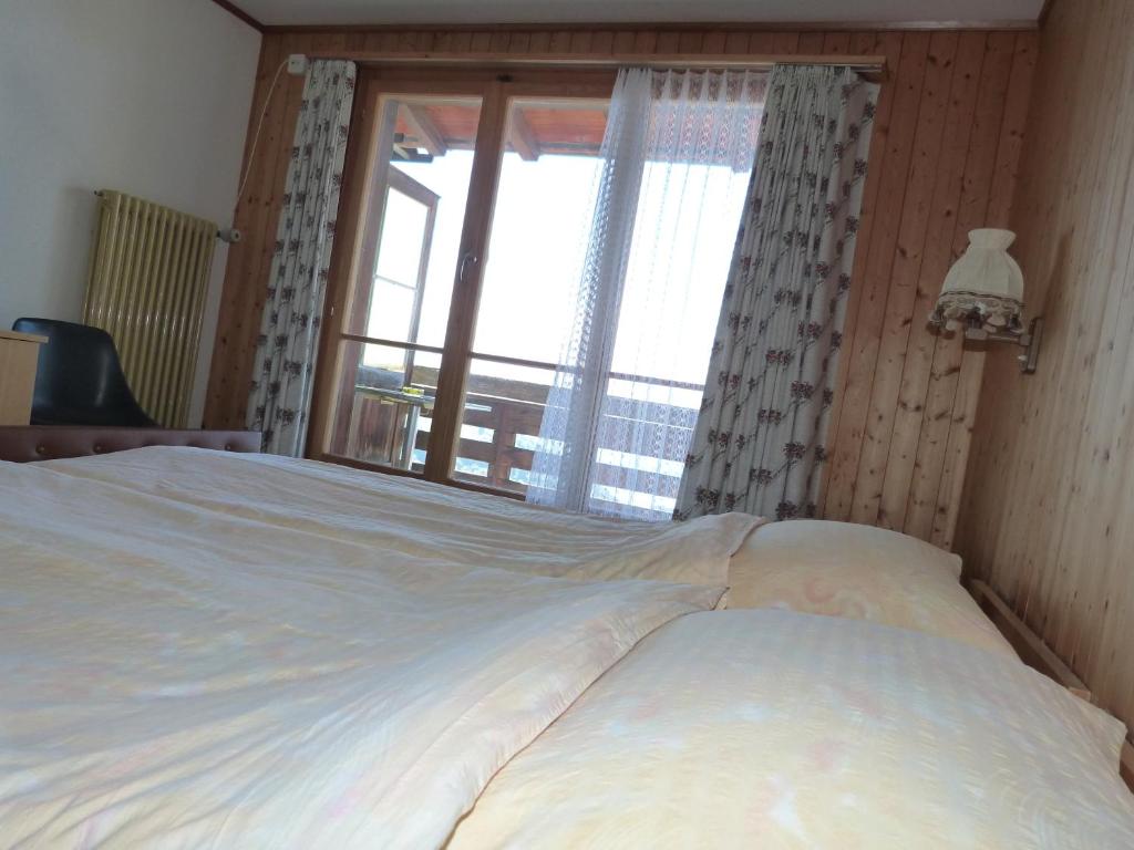 Postel nebo postele na pokoji v ubytování Hotel Bellevue
