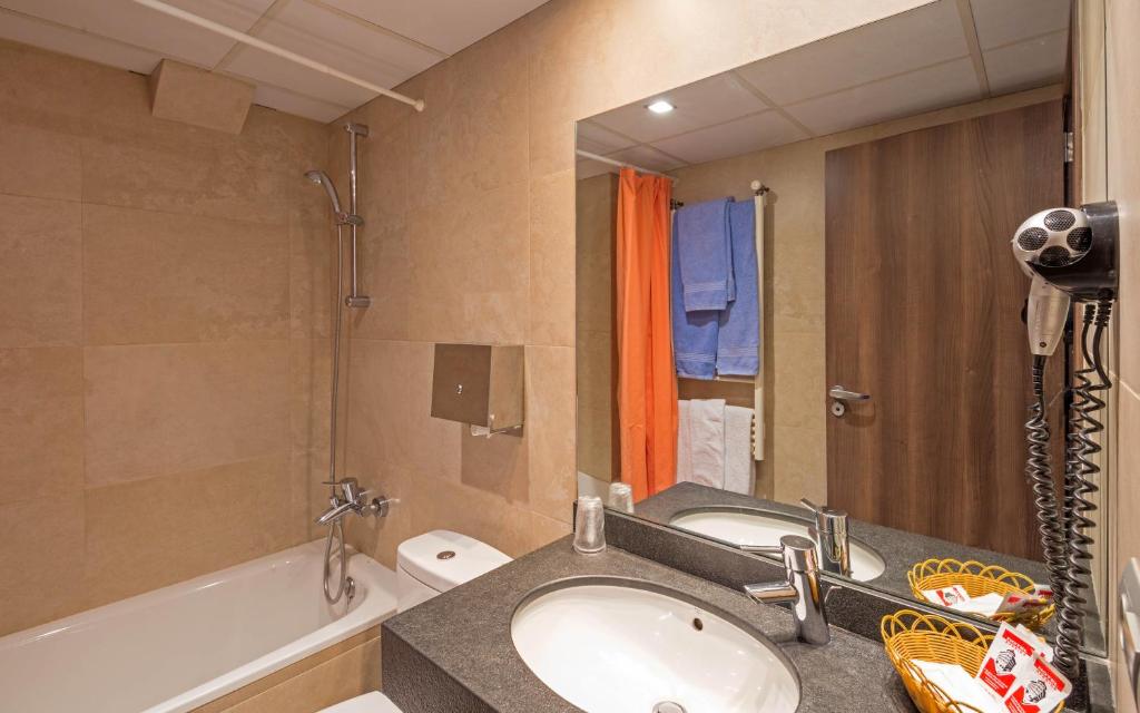 Koupelna v ubytování Hotel Avenida