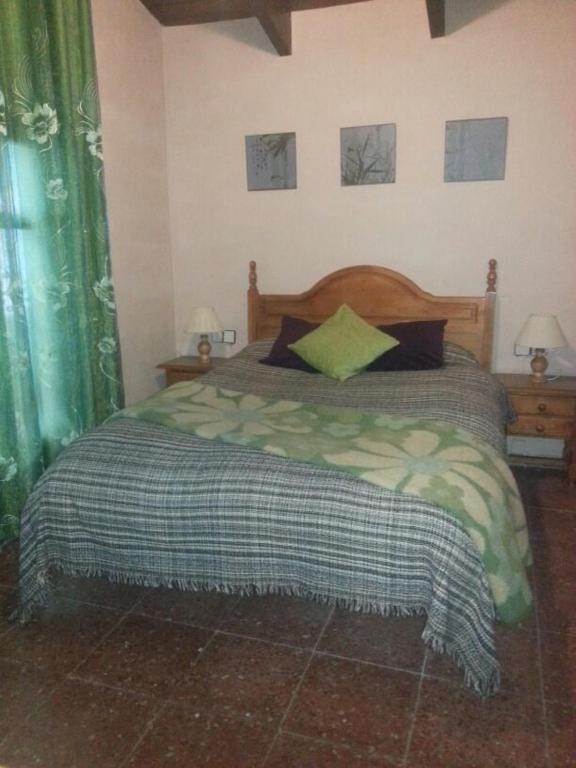 Postel nebo postele na pokoji v ubytování CORTIJO-LA LOMA