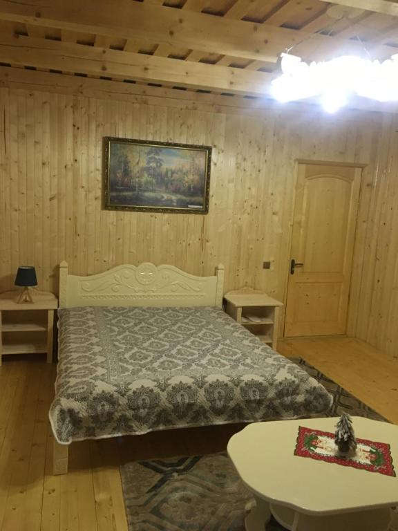 Postel nebo postele na pokoji v ubytování Приватна садиба Шаянське джерело