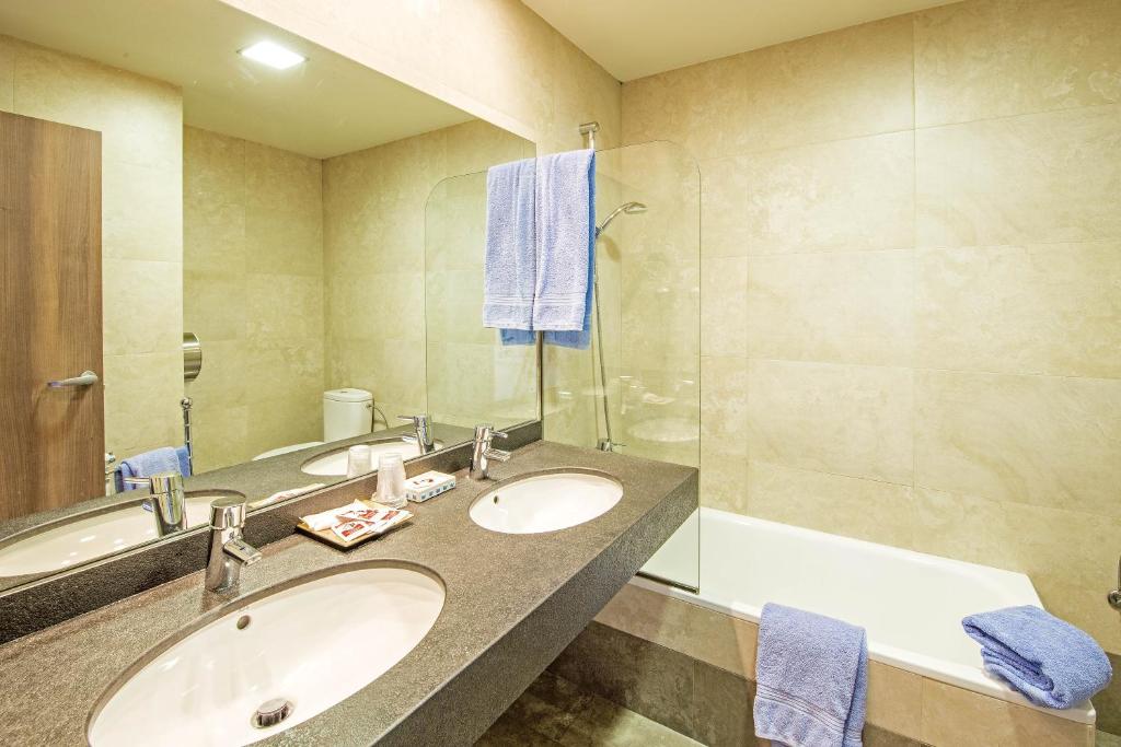 Koupelna v ubytování Hotel Avenida