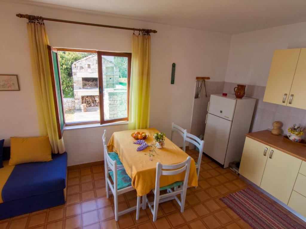 Kuchyň nebo kuchyňský kout v ubytování Aldos House