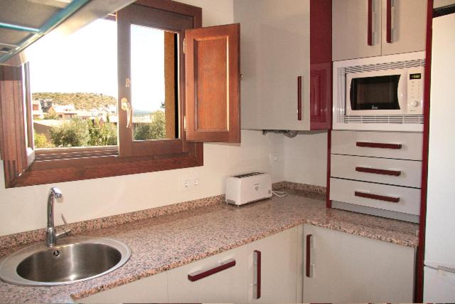 A kitchen or kitchenette at Apartamento Angel e Isabel