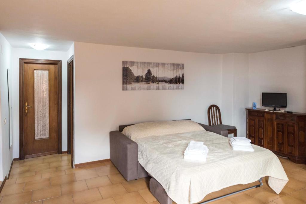 Postel nebo postele na pokoji v ubytování Casa Erika