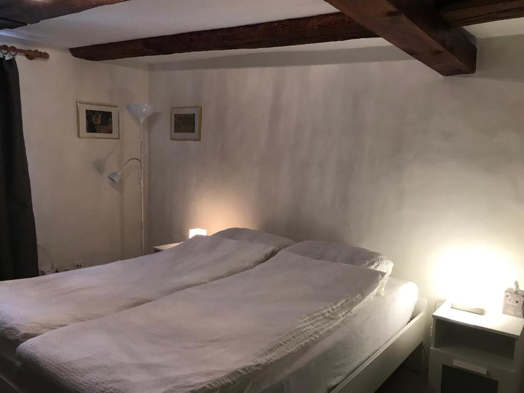 Postel nebo postele na pokoji v ubytování Guesthouse Les Mignardises