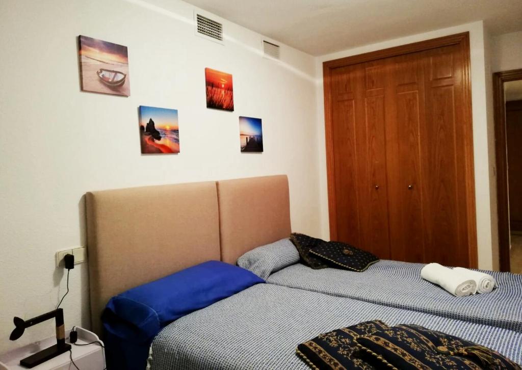 Postel nebo postele na pokoji v ubytování Apartamento Alba