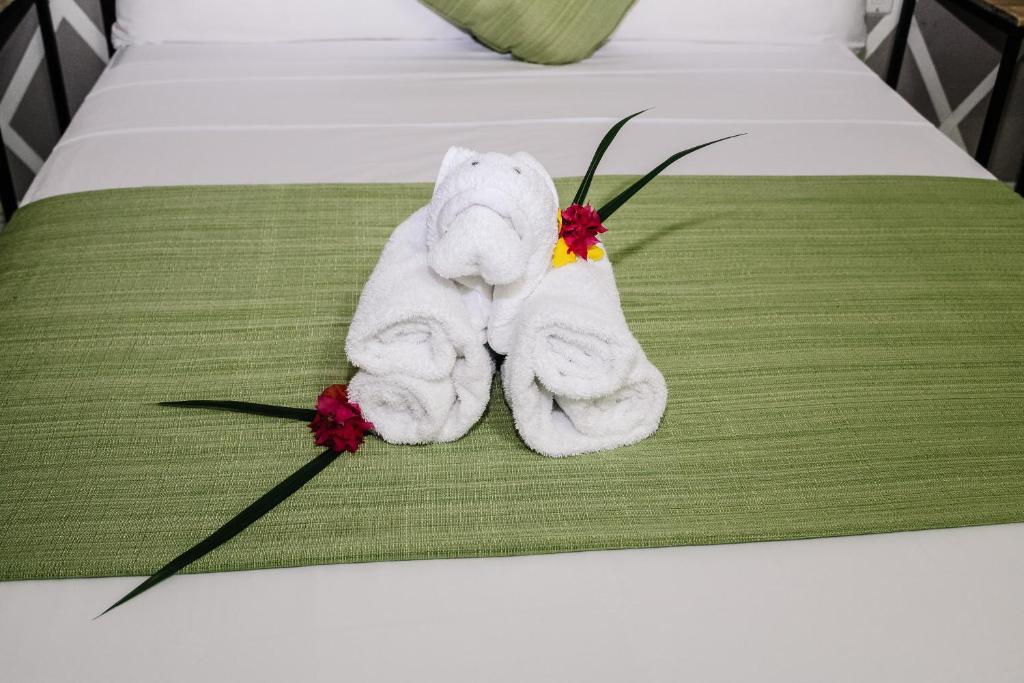 Postel nebo postele na pokoji v ubytování Palm Spring Inn