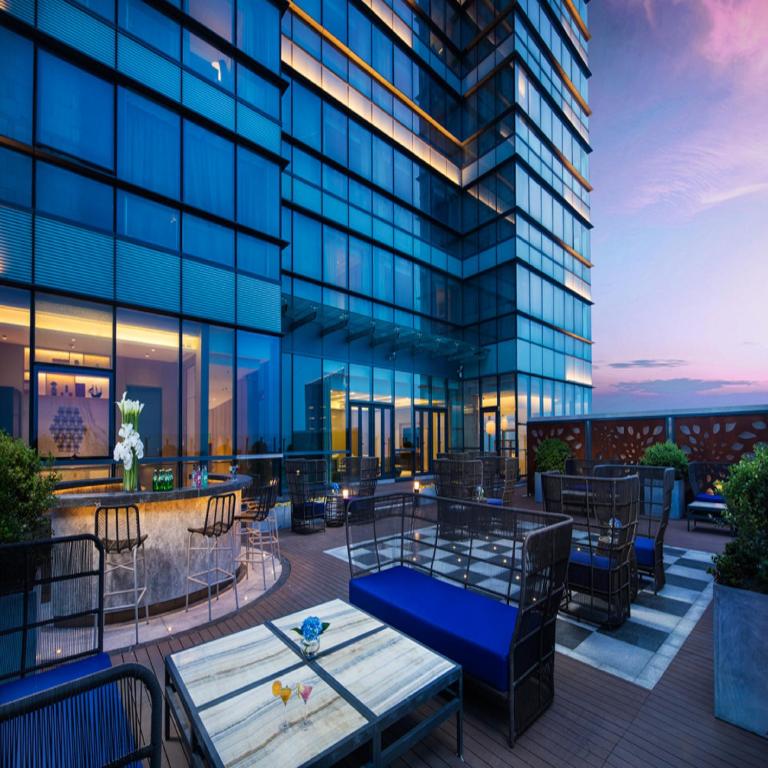 una rappresentazione del patio all'ultimo piano di un edificio di Ascott Harmony City Nantong a Nantong