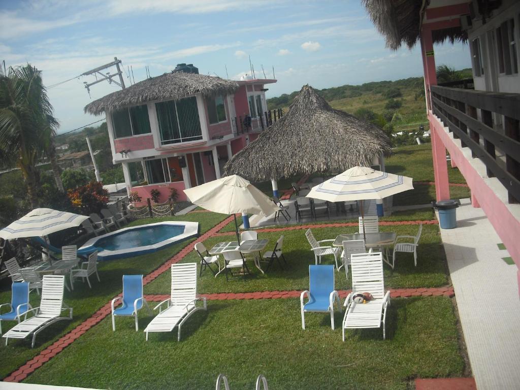 Bazén v ubytování Hotel Villas del Rey nebo v jeho okolí