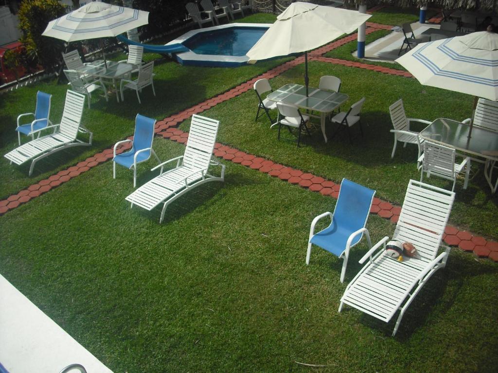 Bazén v ubytování Hotel Villas del Rey nebo v jeho okolí