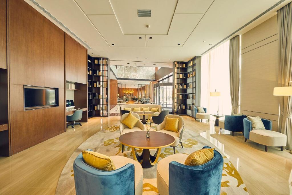 TV a/nebo společenská místnost v ubytování LJZ Supreme Tower Hotel