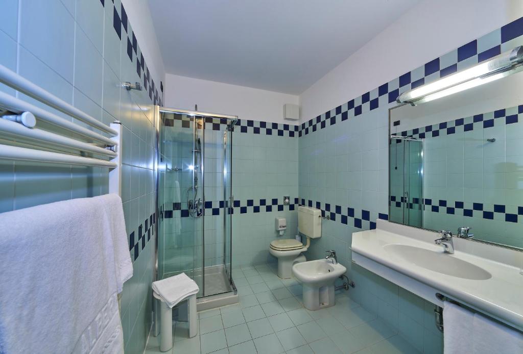 Koupelna v ubytování Hotel Alberi