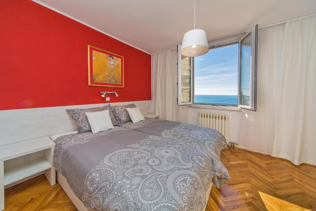 Posteľ alebo postele v izbe v ubytovaní Apartment Residence Narona