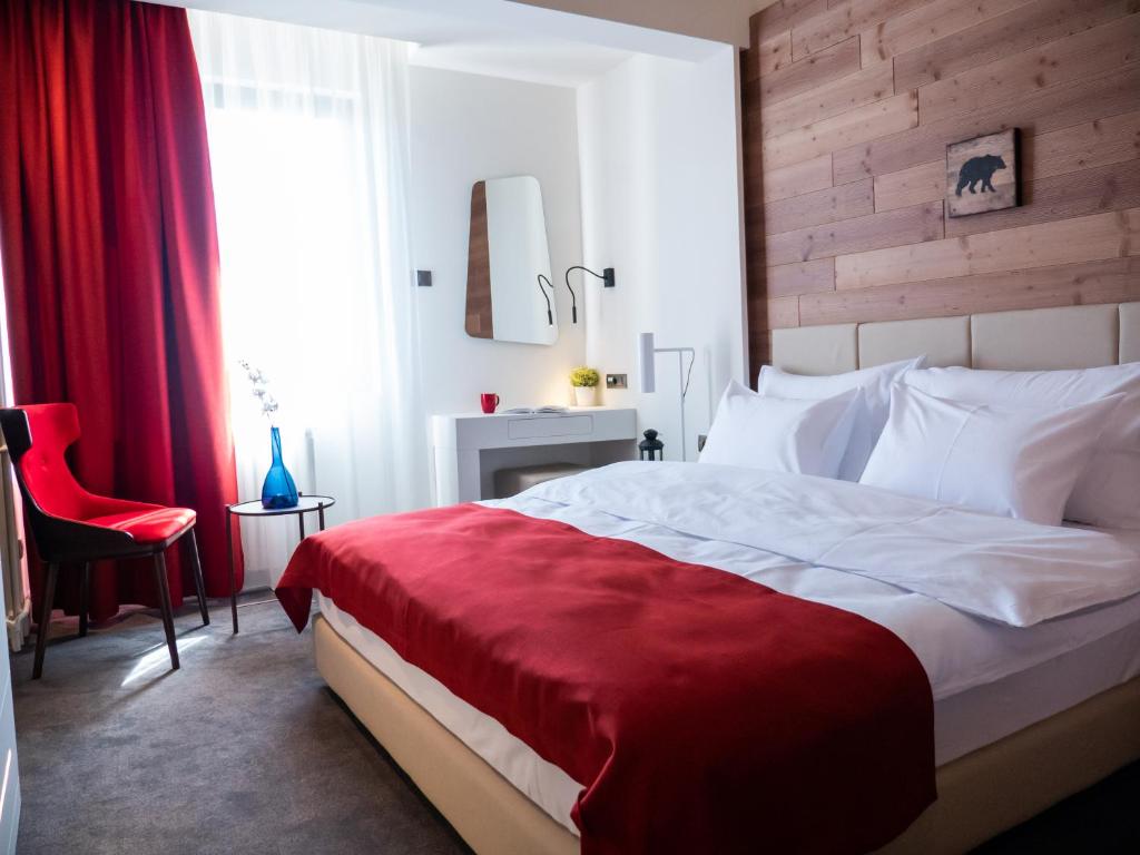 Postel nebo postele na pokoji v ubytování Hotel Putnik Kopaonik