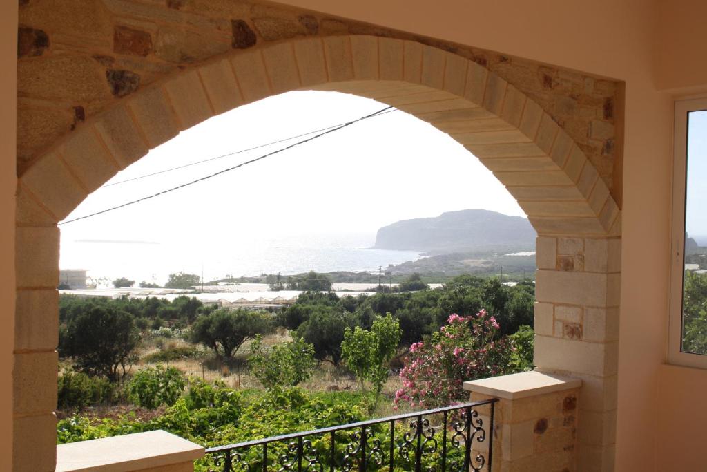 a view from the balcony of a house at Romantica Apartments in Falasarna