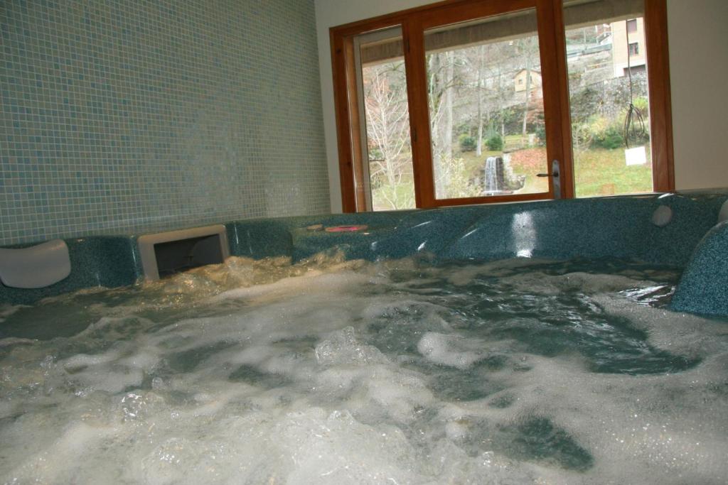 Posezení v ubytování Hôtel Le Chalet