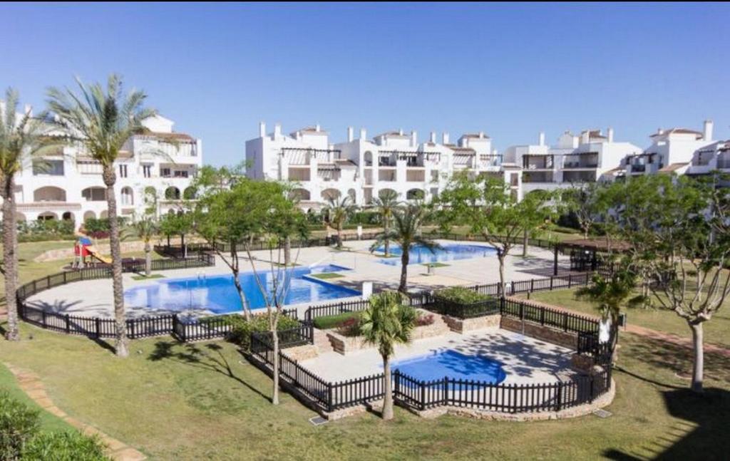 an image of a swimming pool at a resort at Casa Jurel - A Murcia Holiday Rentals Property in Roldán