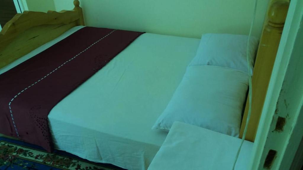 Postel nebo postele na pokoji v ubytování Appartement alhoceima