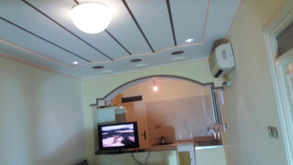 TV a/nebo společenská místnost v ubytování Appartement alhoceima