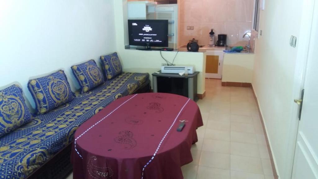 TV a/nebo společenská místnost v ubytování Appartement alhoceima