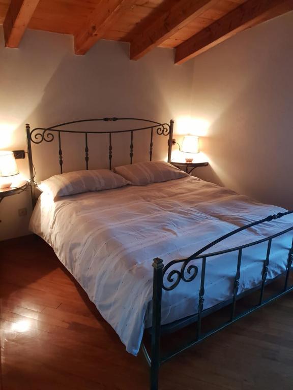 Postel nebo postele na pokoji v ubytování Villa Daniela