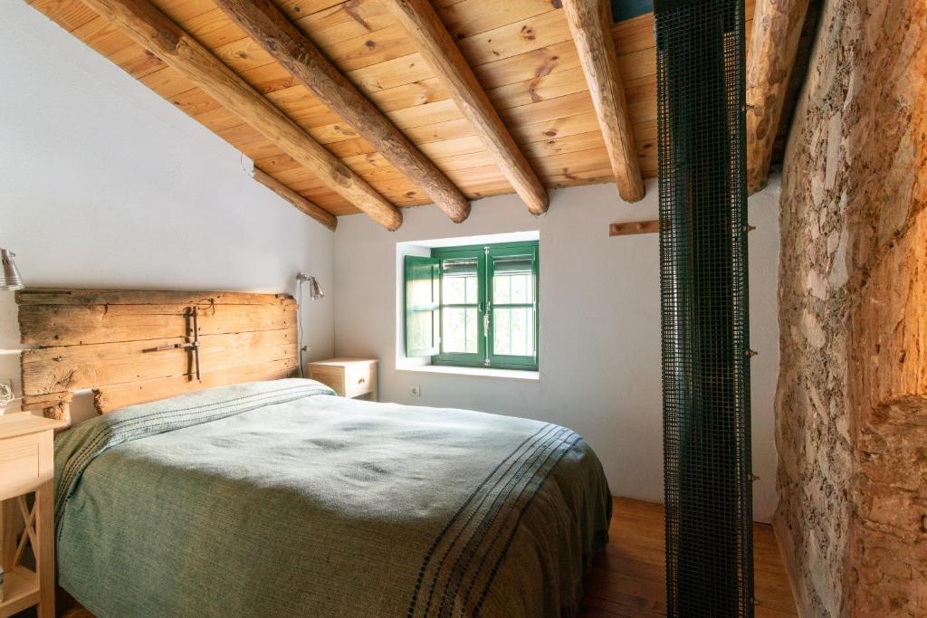Cama o camas de una habitación en Casa de los Curas, chimenea 2 Hab 4 Pers Max
