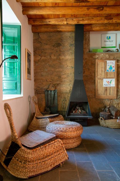 Zona de estar de Casa de los Curas, chimenea 2 Hab 4 Pers Max