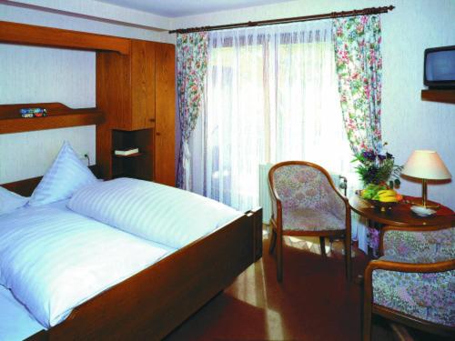 Postel nebo postele na pokoji v ubytování Hostel zum Löwen