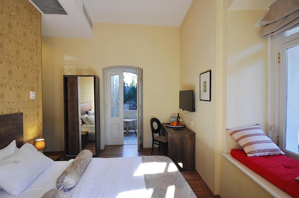 Postel nebo postele na pokoji v ubytování Tekla Palace By Urban Hotels