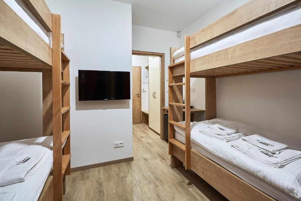 Postel nebo postele na pokoji v ubytování Penzion U Zámku