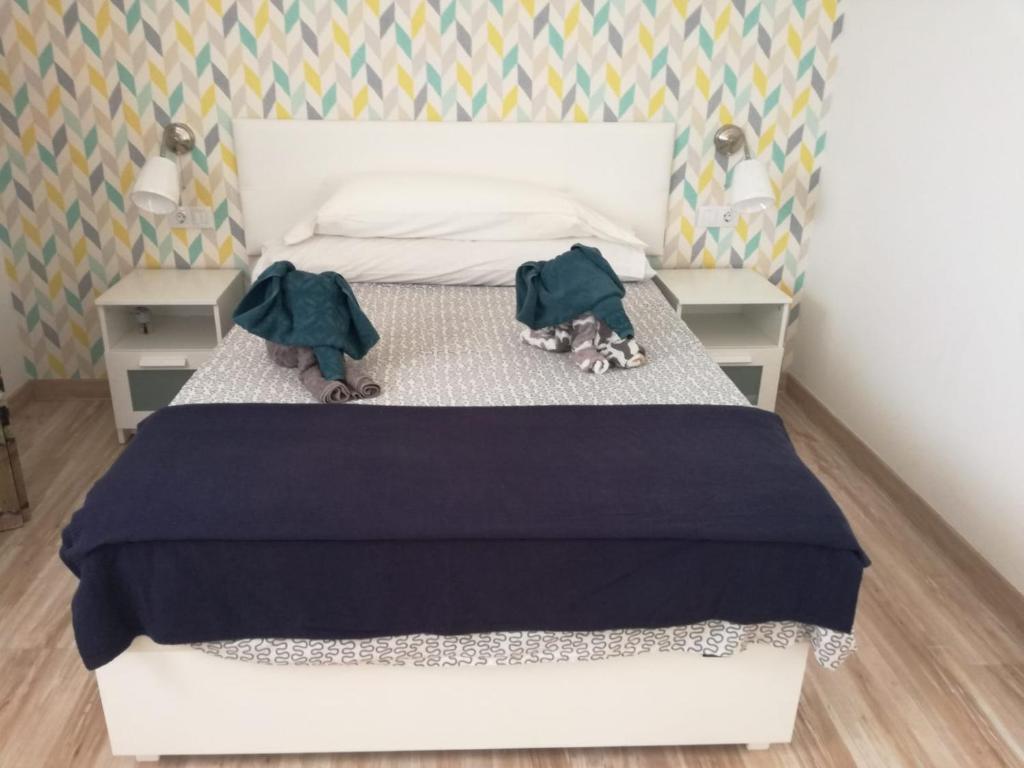 Postel nebo postele na pokoji v ubytování casapueblo