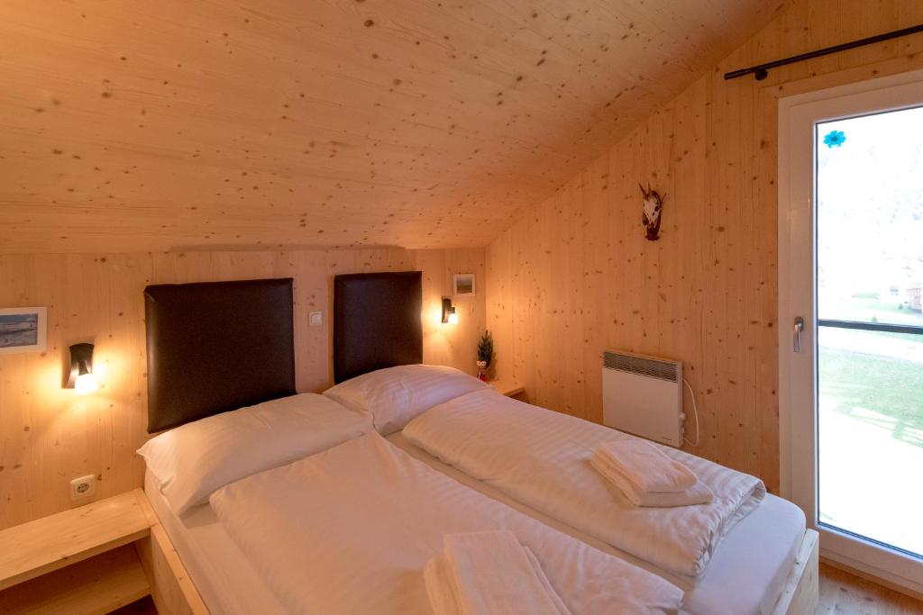 Postel nebo postele na pokoji v ubytování Luxury Chalet Kreischberg 11a