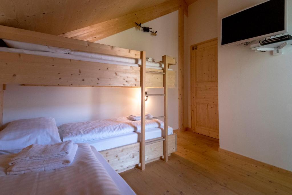 Postel nebo postele na pokoji v ubytování Luxury Chalet Kreischberg 11a