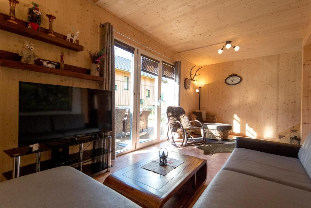 Postel nebo postele na pokoji v ubytování Luxury Chalet Kreischberg 11a