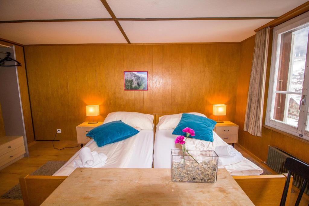 Postel nebo postele na pokoji v ubytování Hotel Hornerpub