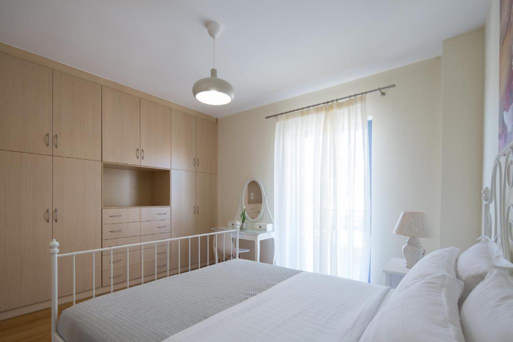 Posteľ alebo postele v izbe v ubytovaní KHouses Maissonette
