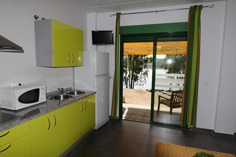 Kuchyň nebo kuchyňský kout v ubytování Apartamentos Villa Vacacional