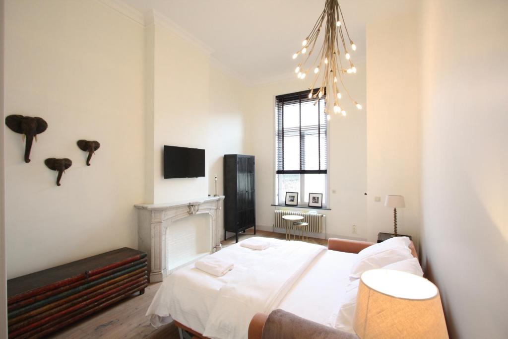 Een bed of bedden in een kamer bij Cap's House