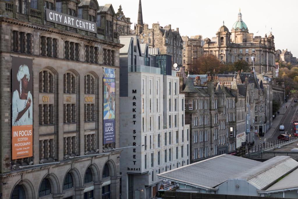 a view of a city with buildings and a street at Market Street hotel in Edinburgh