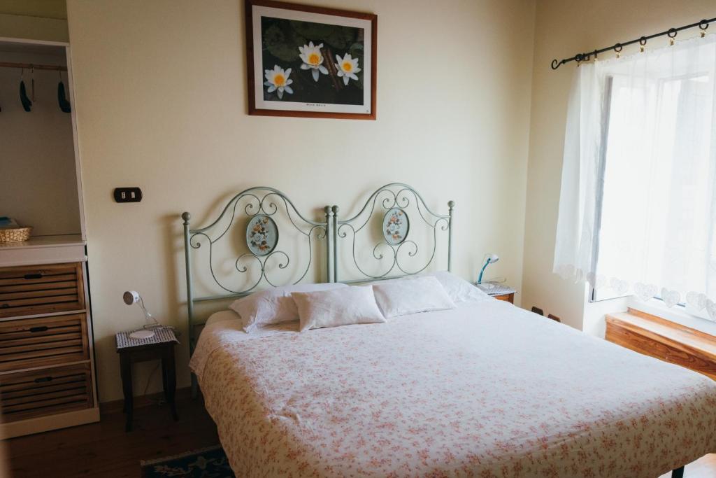 Postel nebo postele na pokoji v ubytování B&B Pedelmont