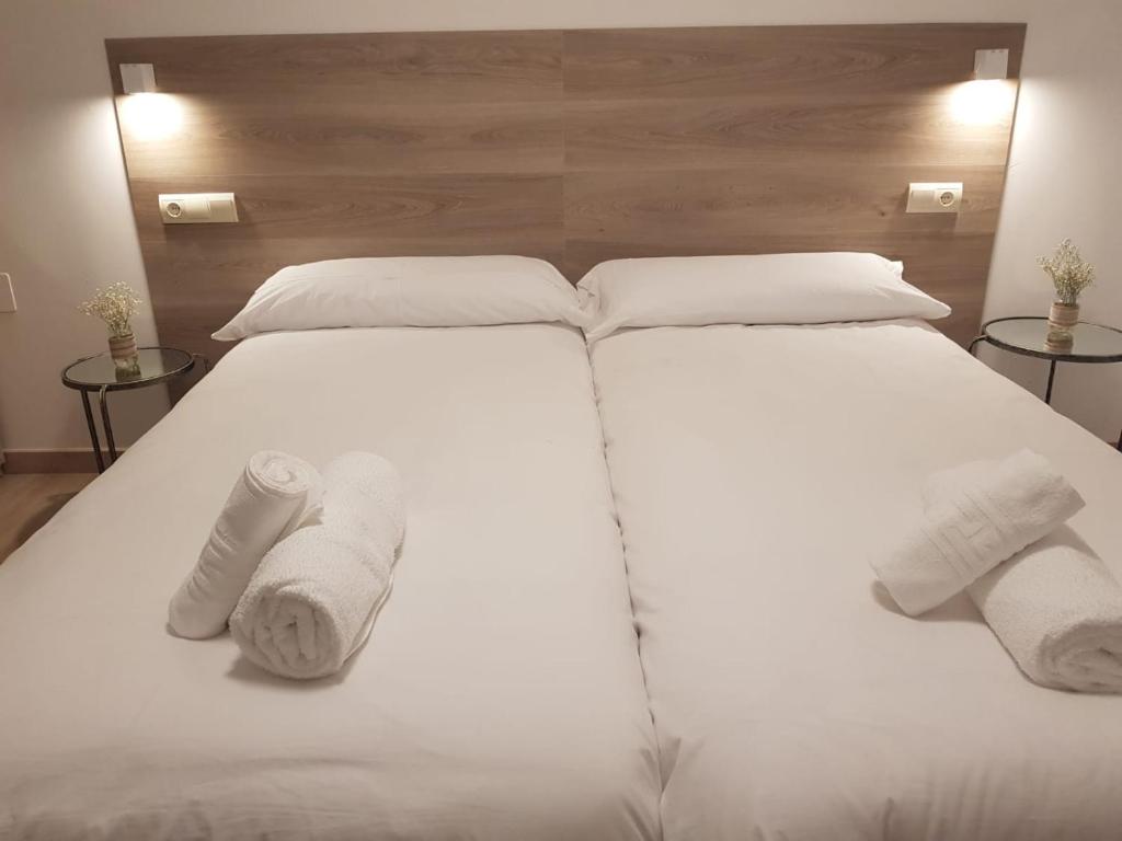 Postel nebo postele na pokoji v ubytování Hotel El Cobertizo