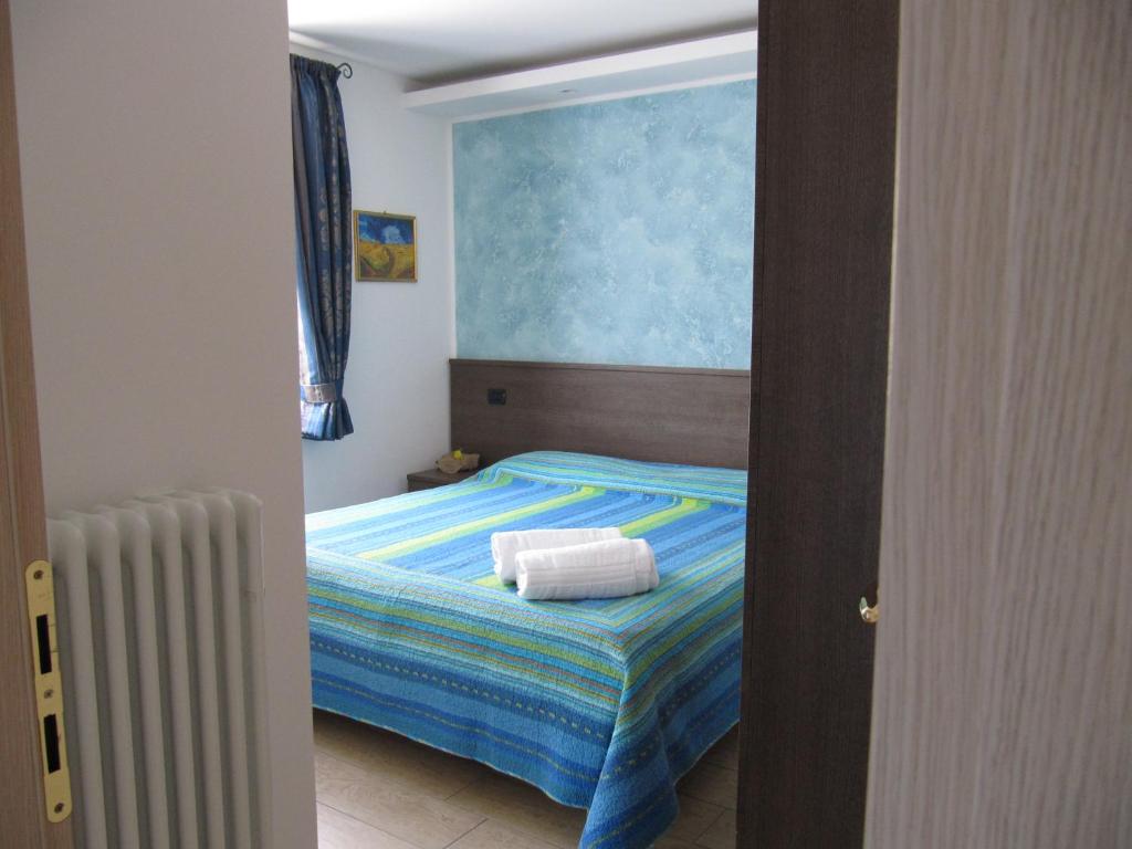 Postel nebo postele na pokoji v ubytování B&B Lori
