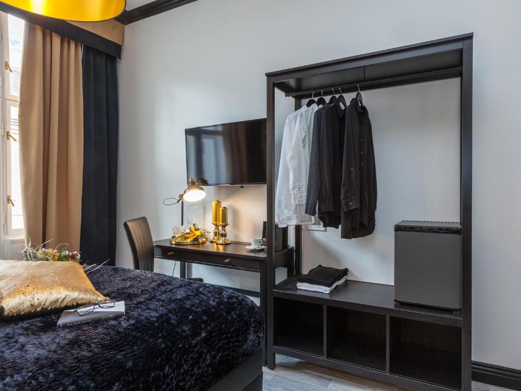 Postel nebo postele na pokoji v ubytování Golden Prague Rooms